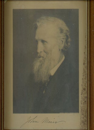 #167858) Photograph of John Muir, signed by him in ink beneath the image. JOHN MUIR